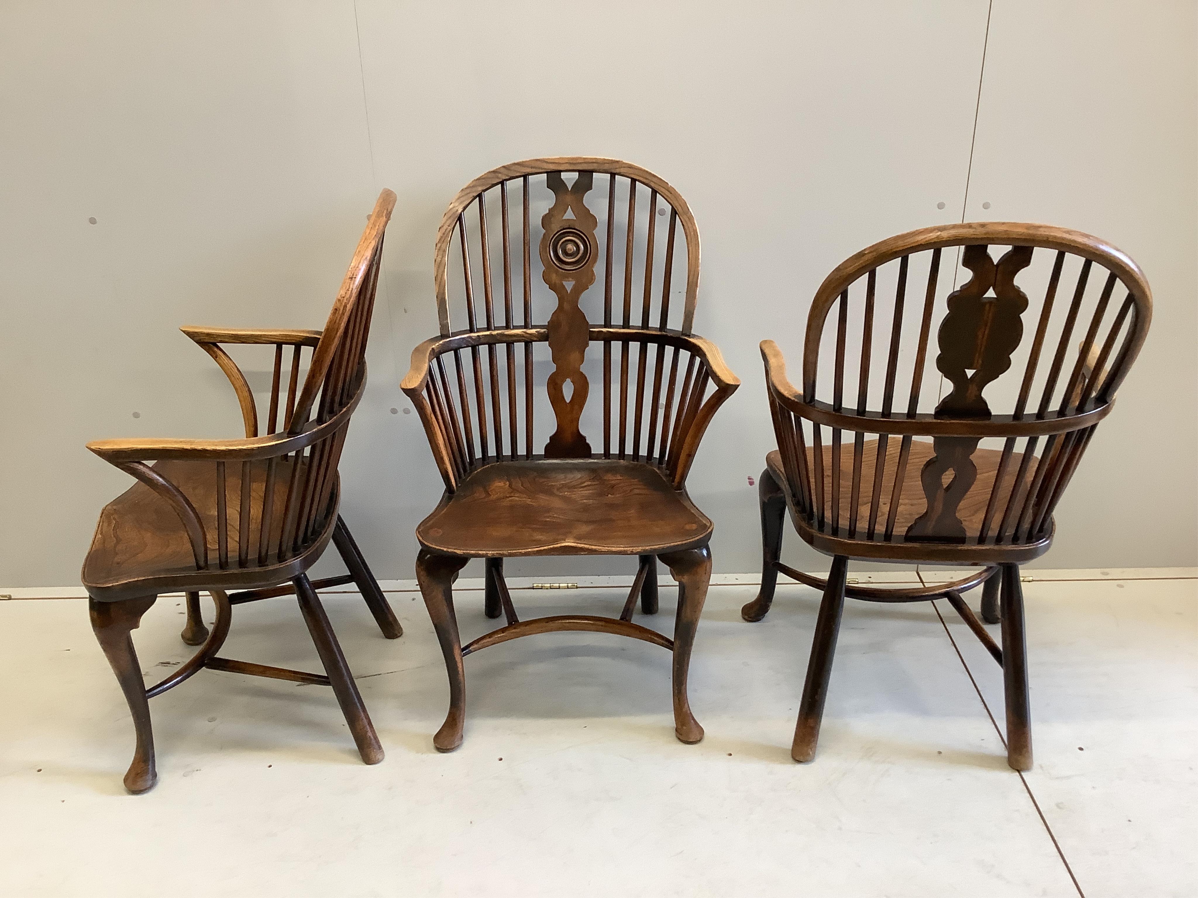 Six (three plus three) reproduction elm and beech Windsor armchairs, larger width 60cm, height 106cm. Condition - poor to fair